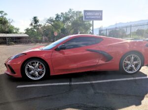 Red C8 Corvette parked at Christian's Automotive in Albuquerque, NM