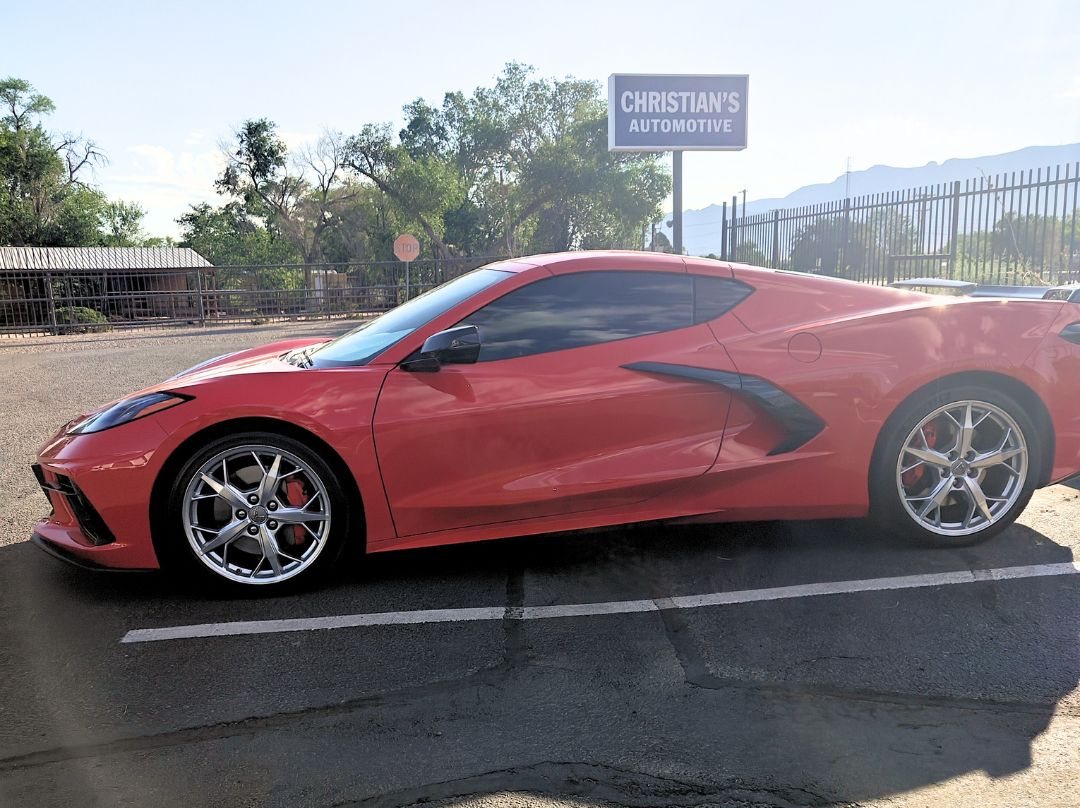 Red C8 Corvette parked at Christian's Automotive in Albuquerque, New Mexico
