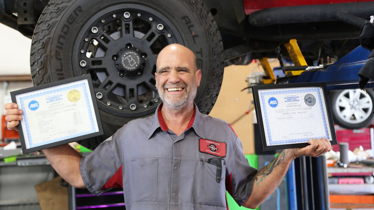 Richard Shows his ASE certificates